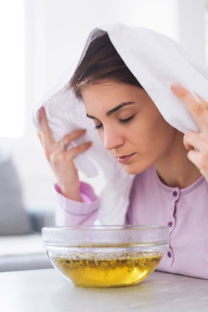 When full blown cold and flu systems occur, ease symptoms of nasal congestion and/or sinus congestion by adding chamomile flowers or 5–10 drops of eucalyptus essential oil (or both!) to boiling water, place your head under a towel over a pot of boiling water—keep a safe distance—and inhale the steaming vapors for 10–15 minutes.